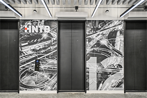 Custom Covering in Workplace Elevator Corridor