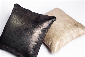 Stardust 

Stardust is the ultimate expression of glamour and refinement, fusing natural hair-on-hide with advanced
finishing techniques. A state-of-the-art metallic dusting is applied through a specialized foil-transfer process,
creating a luminous, sophisticated sheen that enhances the natural texture of the hide. The result is a striking
yet elegant surface—bold, tactile, and unmistakably luxurious.

Natural beauty is found in the organic irregularities and variations from hide-to-hide ranging from hair length,
color, cowlicks, fat wrinkles and other signifiers. These natural traits are inherent to this product and are not
considered to be defects or flaws. No two hides will ever be the same.

This leather offers endless design opportunities for upholstery, rugs, wall coverings and other accents.