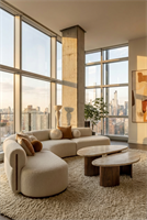 Agnes is a restrained coffee table conceived as a luxury travertine coffee table for considered interiors. Its low elliptical top and compact plinth read as a composed centrepiece that anchors seating without overwhelming the plan. The top is book-matched travertine set on a pared base, a study in veined stone, honed surface and careful stone cutting. The piece borrows the measured language of an organic form to emphasise material clarity. Proportions are tuned to sit close to sofas, offering a generous surface that modulates light and texture; the top responds to touch with a subtle sheen and a calm tactile weight that steadies a room.